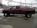 2001 Dark Garnet Red Pearl Dodge Ram 3500 SLT Club Cab 4x4 Dually  photo #2