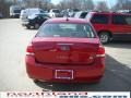 2010 Sangria Red Metallic Ford Focus SE Sedan  photo #7