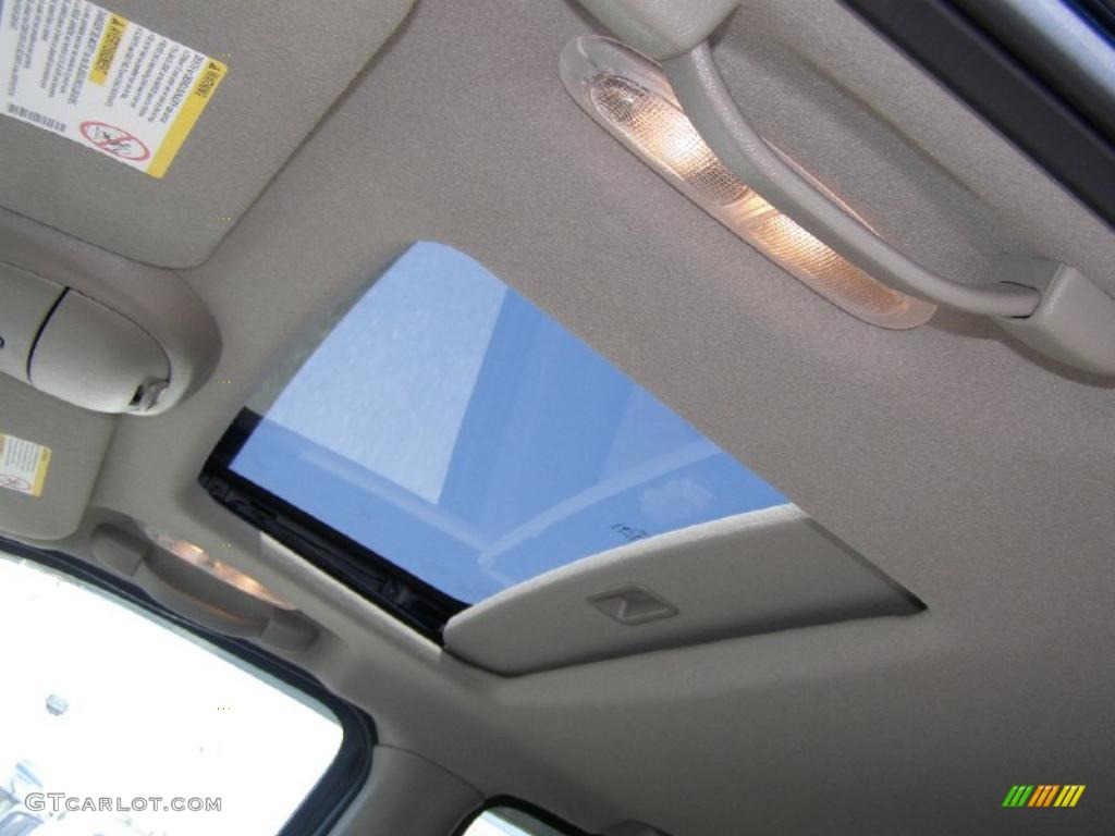 2004 Envoy SLT 4x4 - Indigo Blue Metallic / Medium Pewter photo #12