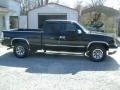 2004 Black Chevrolet Silverado 1500 LS Extended Cab 4x4  photo #4