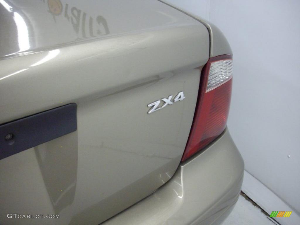 2005 Focus ZX4 SE Sedan - Arizona Beige Metallic / Dark Pebble/Light Pebble photo #5