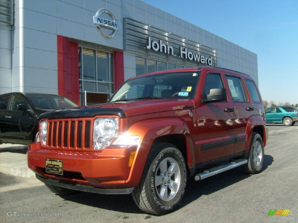 2009 Liberty Sport 4x4 - Sunburst Orange Pearl / Light Pebble Beige photo #1