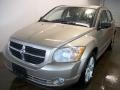 2010 Light Sandstone Metallic Dodge Caliber Mainstreet  photo #1