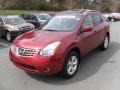 2009 Venom Red Nissan Rogue SL AWD  photo #1