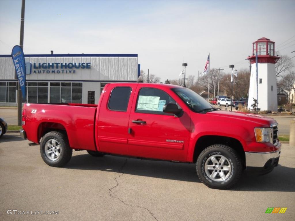 2010 Sierra 1500 SLE Extended Cab 4x4 - Fire Red / Ebony photo #1