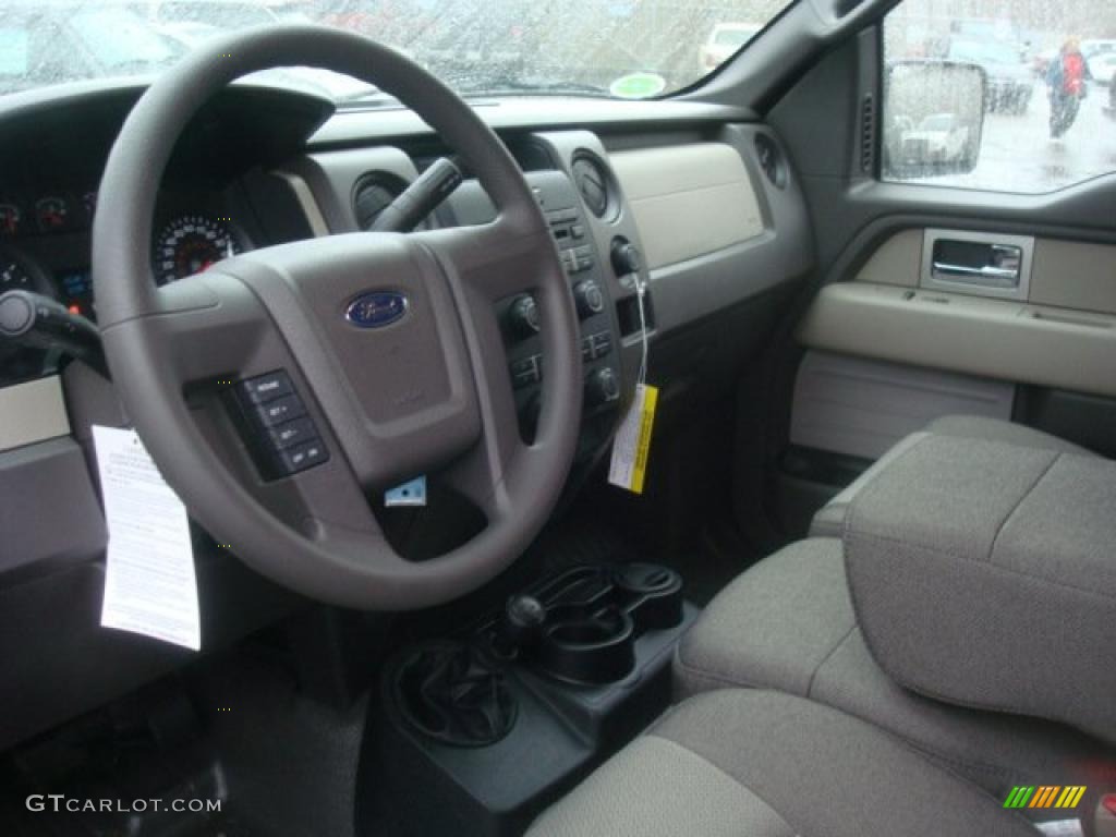 2010 F150 STX SuperCab 4x4 - Tuxedo Black / Medium Stone photo #17