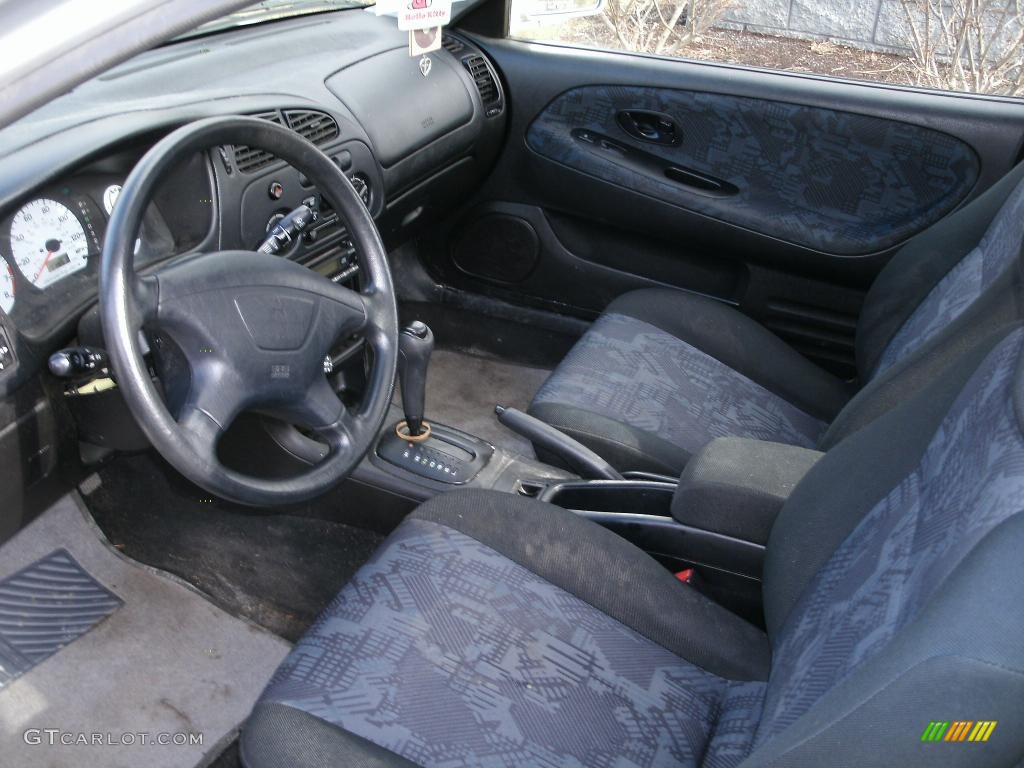 2002 Mirage LS Coupe - Munich Silver Metallic / Black photo #11