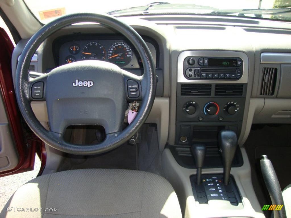 2003 Grand Cherokee Laredo 4x4 - Dark Garnet Red Pearl / Taupe photo #34