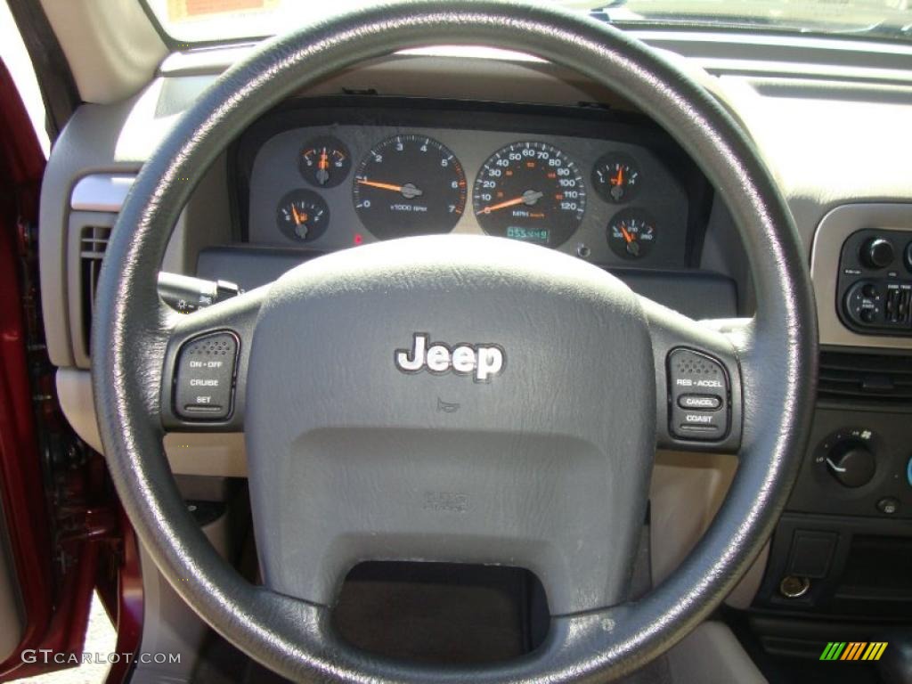 2003 Grand Cherokee Laredo 4x4 - Dark Garnet Red Pearl / Taupe photo #35