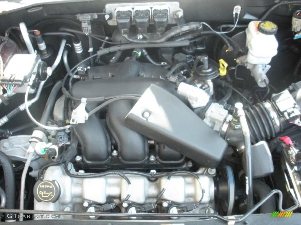 2005 Mariner V6 Premier 4WD - Charcoal Beige Metallic / Black/Light Parchment photo #20