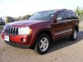 2007 Red Rock Crystal Pearl Jeep Grand Cherokee Limited  photo #1