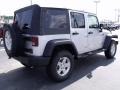 2010 Bright Silver Metallic Jeep Wrangler Unlimited Islander Edition 4x4  photo #3