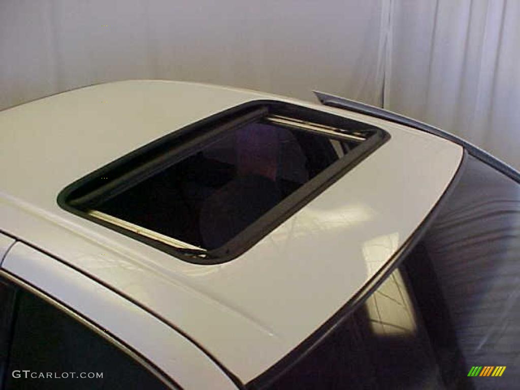 1998 Maxima  - Arctic White Pearl Metallic / Black photo #5