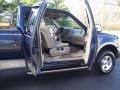 2002 True Blue Metallic Ford F150 XLT SuperCab 4x4  photo #25