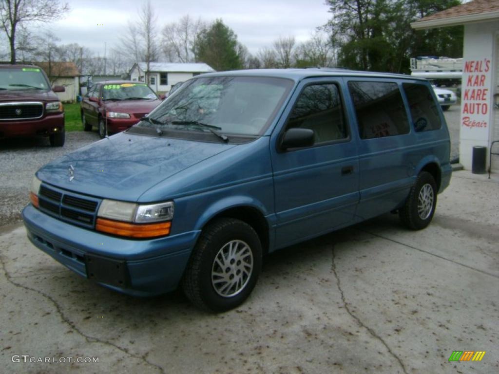 Island Teal Metallic Dodge Caravan