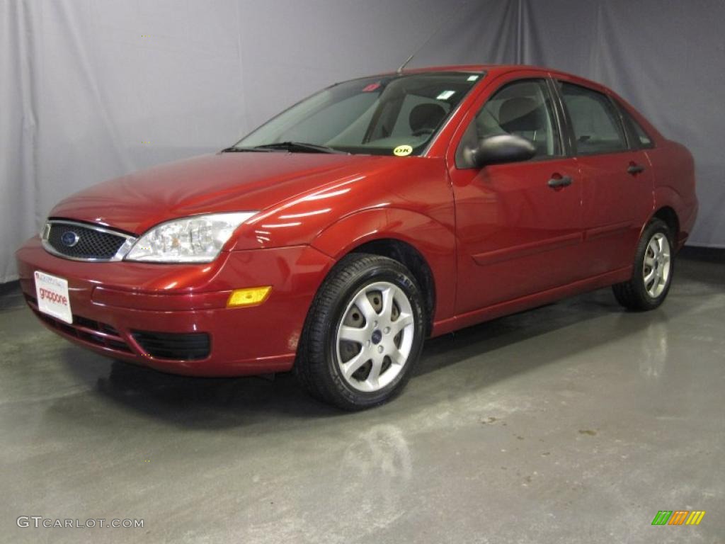 2005 Focus ZX4 SE Sedan - Sangria Red Metallic / Dark Flint/Light Flint photo #1