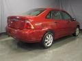 2005 Sangria Red Metallic Ford Focus ZX4 SE Sedan  photo #3