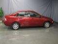 2005 Sangria Red Metallic Ford Focus ZX4 SE Sedan  photo #4