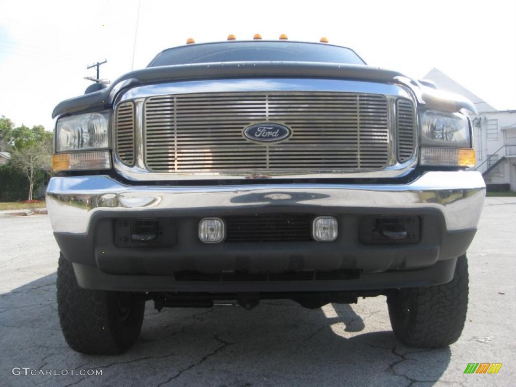 2004 F350 Super Duty Lariat Crew Cab 4x4 - Dark Toreador Red Metallic / Medium Parchment photo #1