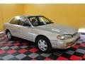 1996 Cashmere Beige Metallic Toyota Camry LE Sedan  photo #1