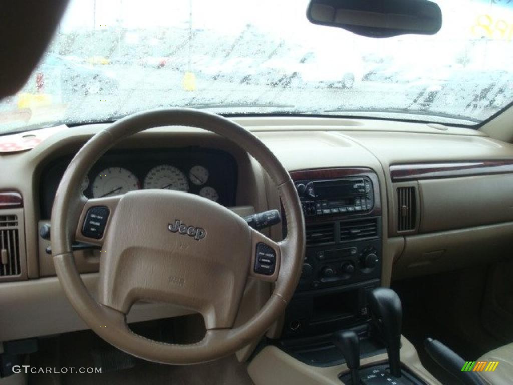 2004 Grand Cherokee Limited 4x4 - Deep Lava Red Metallic / Sandstone photo #10