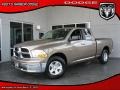 2010 Austin Tan Pearl Dodge Ram 1500 SLT Quad Cab  photo #1