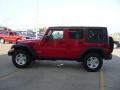 2010 Flame Red Jeep Wrangler Unlimited Rubicon 4x4  photo #5