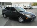 2003 Pitch Black Ford Focus SE Sedan  photo #11