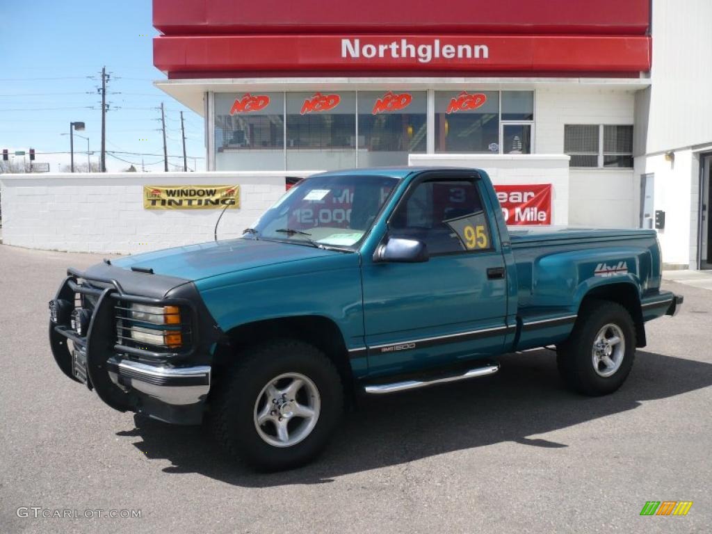 1995 Sierra 1500 SL Regular Cab 4x4 - Bright Teal Metallic / Beige photo #1