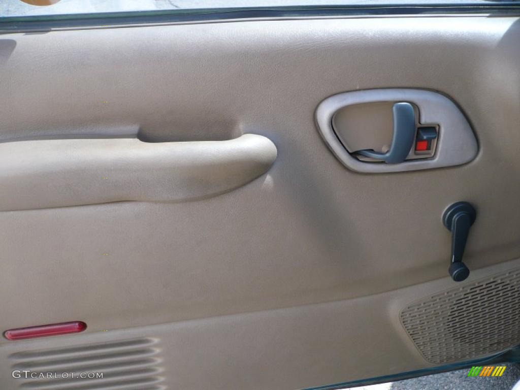 1995 Sierra 1500 SL Regular Cab 4x4 - Bright Teal Metallic / Beige photo #7