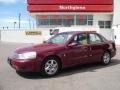 2005 Berry Red Saturn L Series L300 Sedan  photo #1