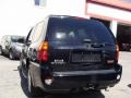 2006 Black Onyx GMC Envoy Denali 4x4  photo #5