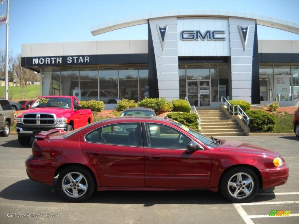 2003 Grand Am SE Sedan - Redfire Metallic / Dark Pewter photo #1