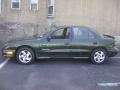2000 Spruce Green Metallic Pontiac Sunfire SE Sedan  photo #1