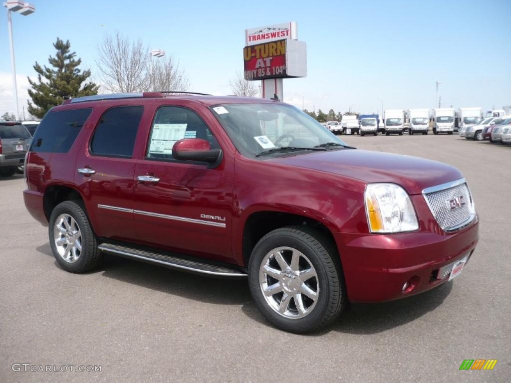 2010 Yukon Denali AWD - Red Jewel Tintcoat / Ebony photo #1