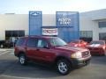 2004 Redfire Metallic Ford Explorer XLS 4x4  photo #1