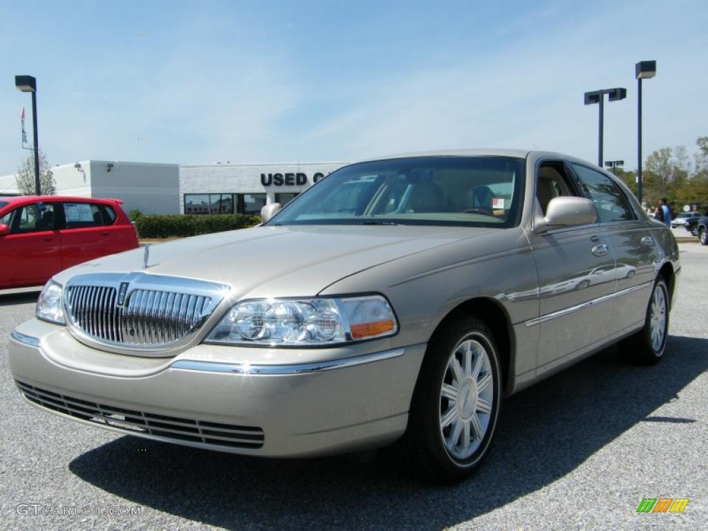 Light French Silk Metallic Lincoln Town Car