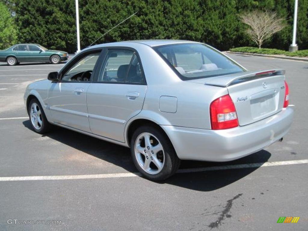 2002 Protege LX - Sunlight Silver Metallic / Off Black photo #2