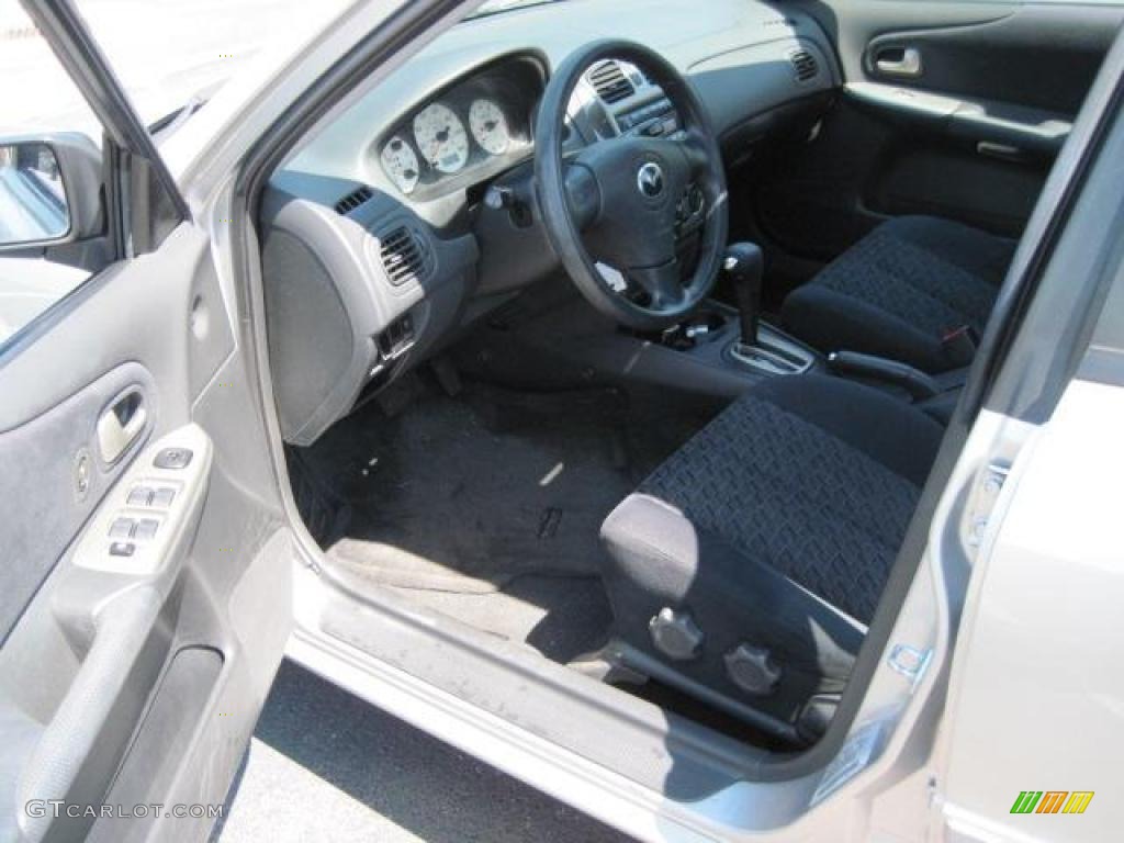 2002 Protege LX - Sunlight Silver Metallic / Off Black photo #4