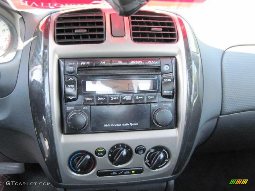 2002 Protege LX - Sunlight Silver Metallic / Off Black photo #8