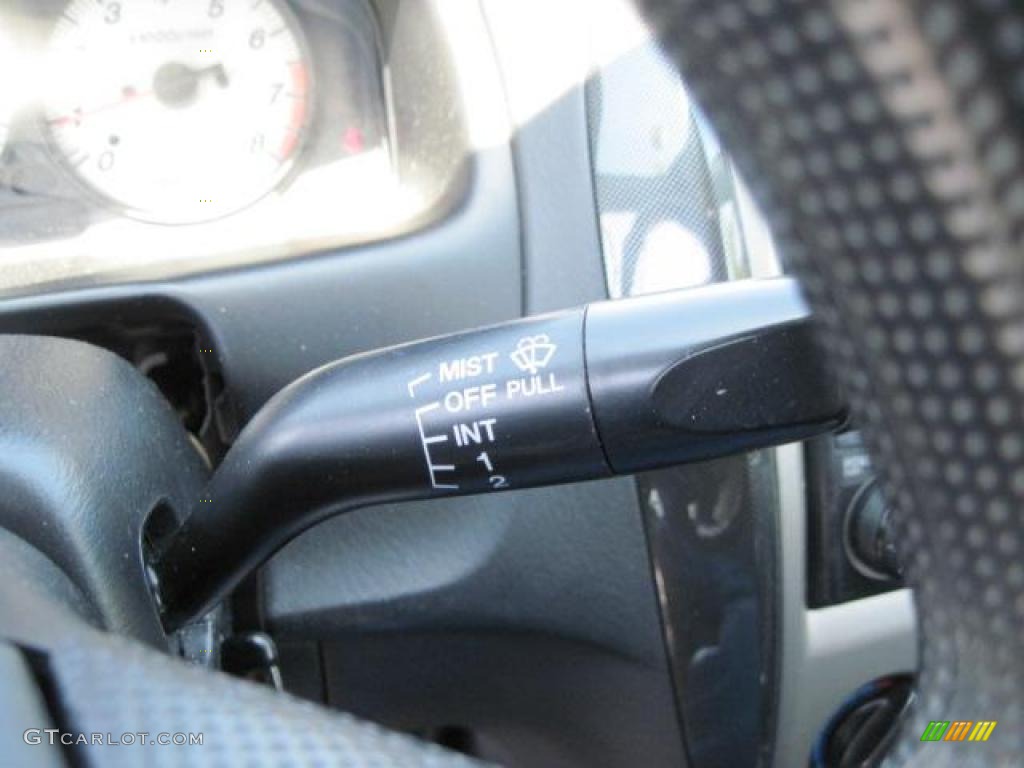 2002 Protege LX - Sunlight Silver Metallic / Off Black photo #11