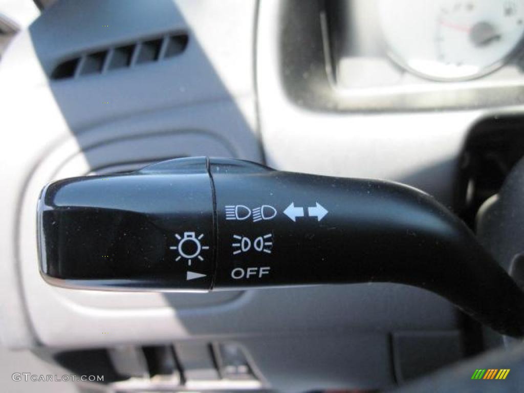 2002 Protege LX - Sunlight Silver Metallic / Off Black photo #12