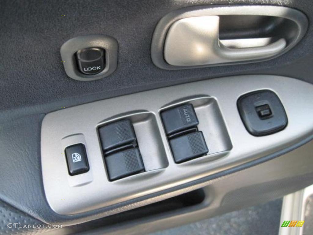 2002 Protege LX - Sunlight Silver Metallic / Off Black photo #13