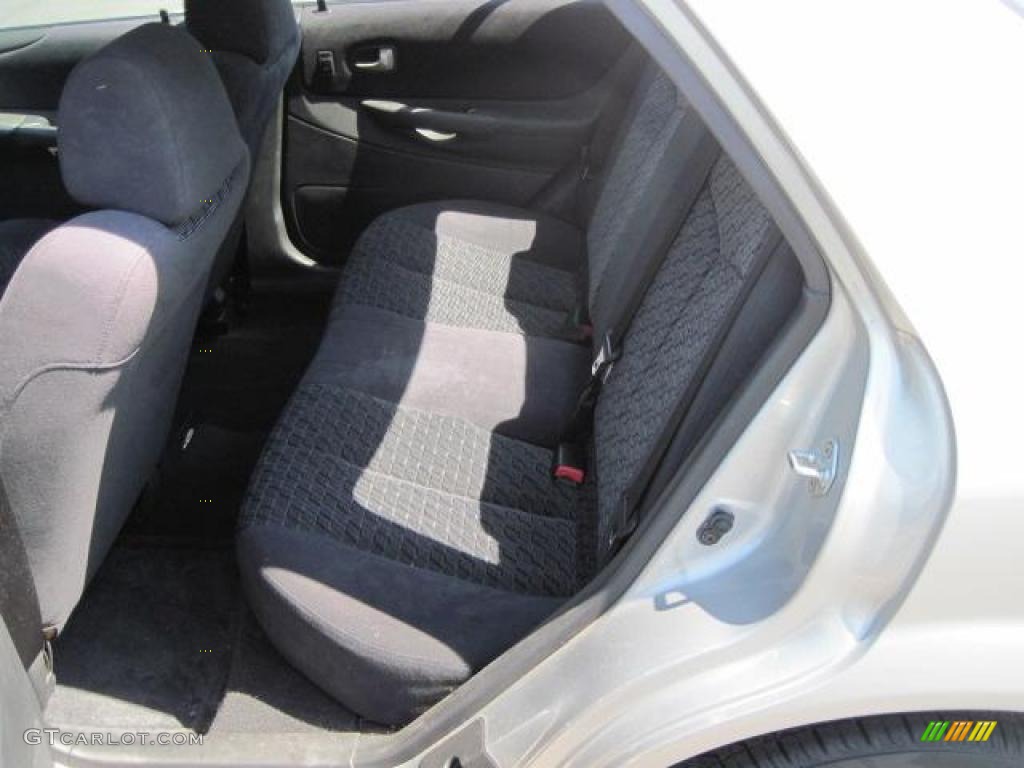 2002 Protege LX - Sunlight Silver Metallic / Off Black photo #17