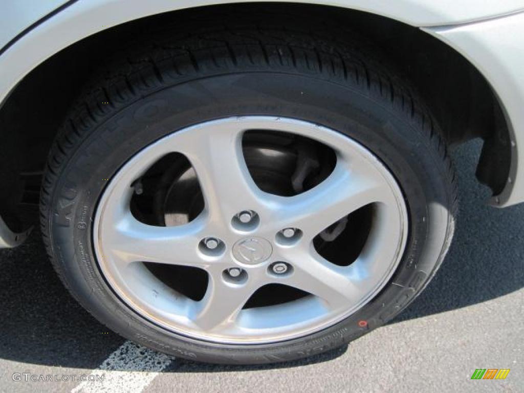 2002 Protege LX - Sunlight Silver Metallic / Off Black photo #18