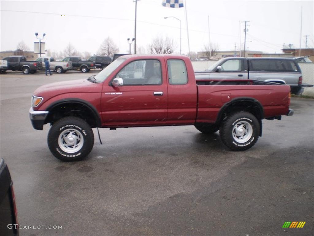 1996 Tacoma SR5 Extended Cab 4x4 - Sunfire Red Pearl / Gray photo #1