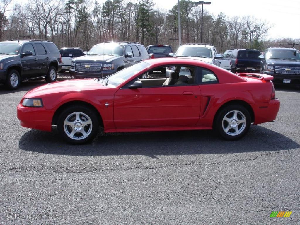 2003 Mustang V6 Coupe - Torch Red / Medium Parchment photo #9