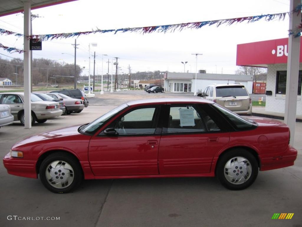 1996 Cutlass Supreme SL Sedan - Bright Red / Pewter photo #2