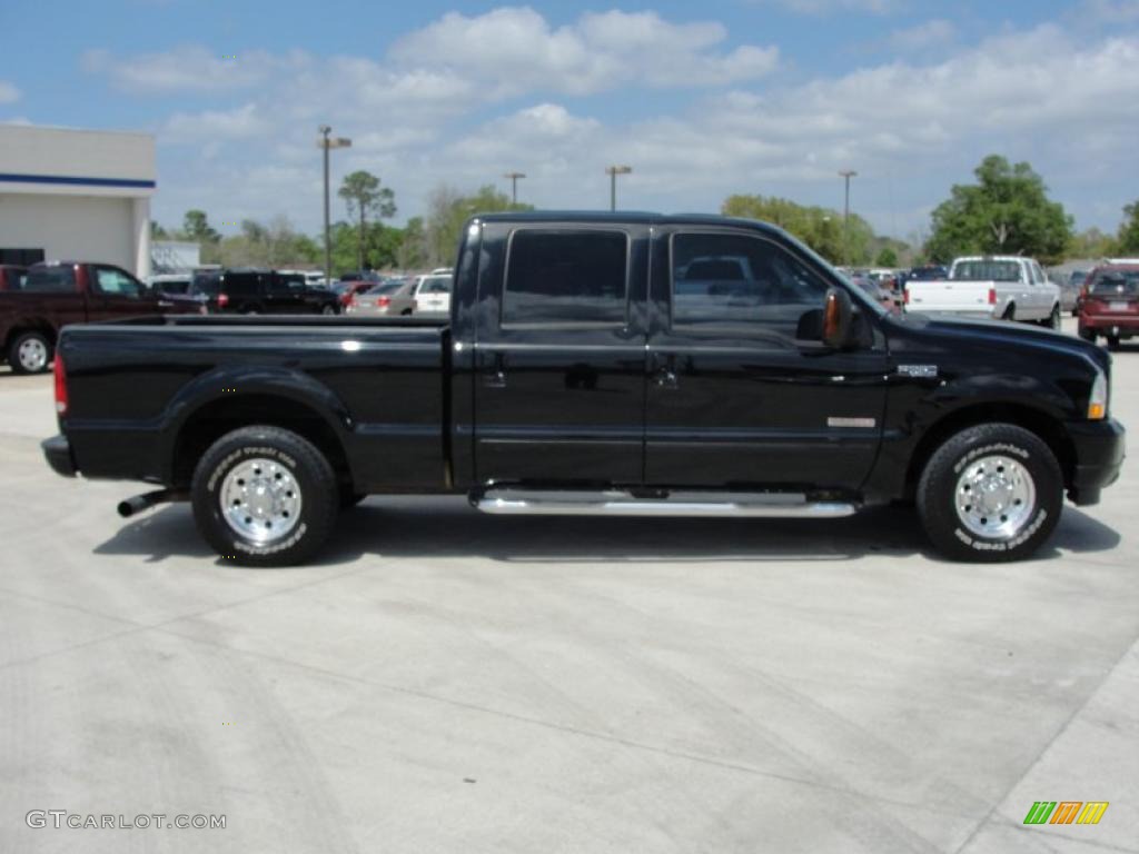 2004 F250 Super Duty XLT Crew Cab - Black / Black photo #2