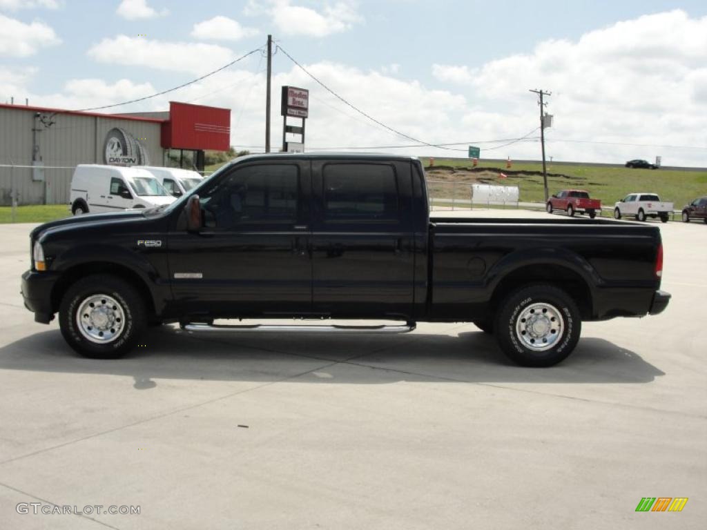 2004 F250 Super Duty XLT Crew Cab - Black / Black photo #6